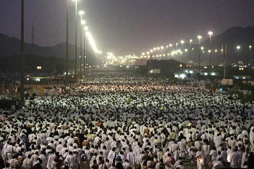 Muslim pilgrims leave Arafat to Muzdalifah for the next step in the Hajj. (AP
Photo/Hassan Ammar)