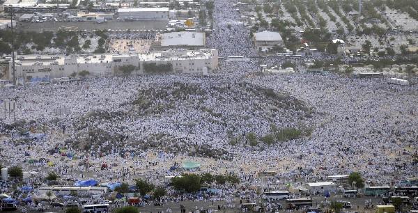 Muslim pilgrims leave Arafat to Muzdalifah for the next step in the Hajj. (AP
Photo/Hassan Ammar)