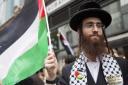A Jewish demonstrator calling for a halt to the Gaza bombings. Picture Reuters
