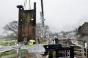 HIGHLIGHT:  Workers at the Bingley Five Rise Locks site take out an old lock gate