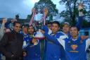 Asjad Hussain of AMT Lawyers presents the Asian Image Cup to Halifax