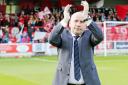Accrington Stanley manager John Coleman salutes the home fans at the final whistle
