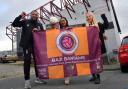 LtR: Humayun Islam, Shazuna Ali, and Lizzie Saunderson outside Valley Parade, the home of Bradford City