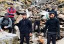A group of Oldham men have climbed the UK’s highest mountain in aid of poor people in Bangladesh while fasting during Ramadan.