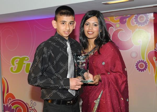 Shelina Begum Editor of the Asian News Website presents the Achievement in Sport Award to Sahir Iqbal