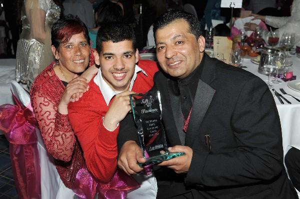 Mumtaz Ellahi Community Coach of the Year Award winners Hashmat and Janet Faqiri. They are pictured with their son Ferrari