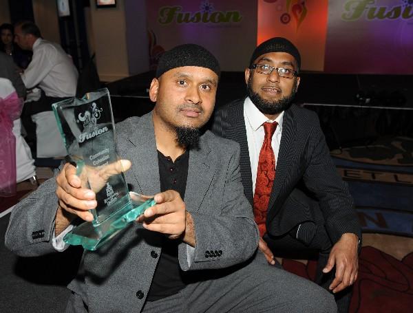 Members of the Oldham Muslim Centre with their award.