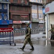 Indian paramilitary soldiers patrol during security lockdown in Srinagar, Indian controlled Kashmir, Wednesday, Aug. 14, 2019. India has maintained an unprecedented security lockdown to try to stave off a violent reaction to Kashmir's downgraded status.