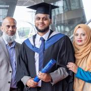 Mohammed with family at his graduation