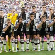 The German team chose to cover their mouths in protest ahead of their first match