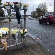 The floral tributes at the scene