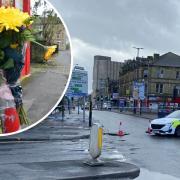 Floral tributes have been laid at the scene of the tragedy in Bradford city centre