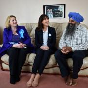 Samantha Cameron (centre) and Brentford and Isleworth Conservative candidate Mary Macleod visit local businessman Baljinder Hansra at his home in Hounslow, West London today.