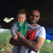 Shazad Shauket (right) on previous visits to assist refugees