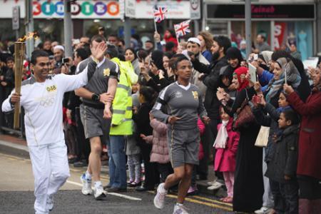 The flame makes its way past Whalley Range Blackburn
