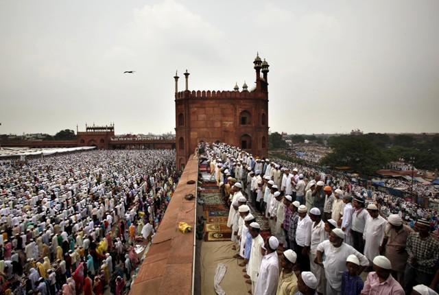 Indian Muslims offer prayer on the last Friday of the holy month of Ramadan at Jama Maszid, in New Delhi, India