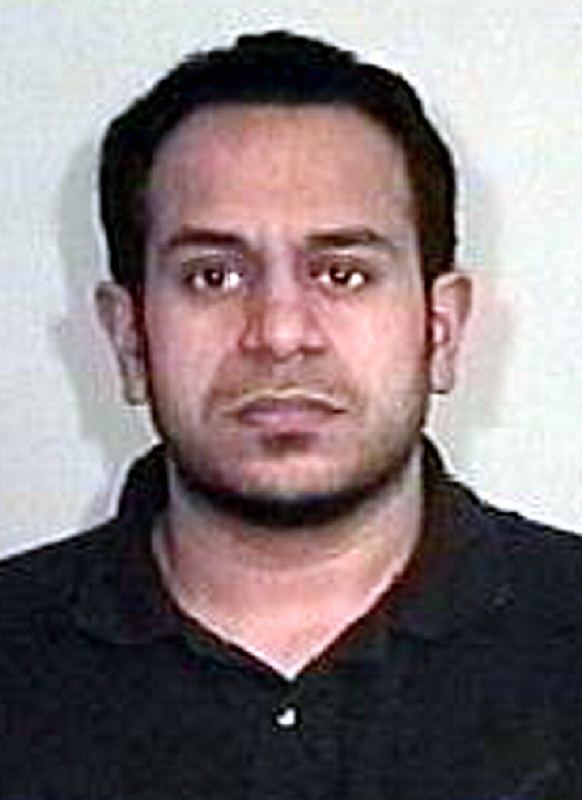 Detectives now believe fugitive <b>Yasar Hussain</b> is in the UK - 2294456