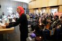 Aneelah Afzali, director of the American Muslim Empowerment Network, voices her opinion during a public hearing in the Seattle City Council chambers