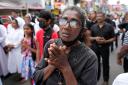 Sri Lankans went on a silent march to mark the fourth anniversary of the bomb attacks (Eranga Jayawardena/AP)