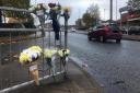The floral tributes at the scene
