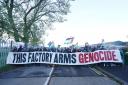 Trade unionists and protesters form a blockade outside weapons manufacturer BAE Systems in Rochester, Kent, in protest over the Israel-Gaza conflict and calling for an immediate ceasefire on Friday November 10.