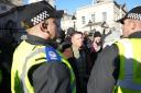 Tommy Robinson speaks to police officers as he arrives at the Cenotaph in Whitehall, central London, ahead of a pro-Palestinian protest march which is taking place from Hyde Park to the US embassy in Vauxhall. (Saturday November 11, 2023.)