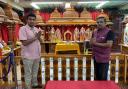 Sunny Patel and Pradeep Bhardwaj at the Swindon Hindu Temple altar. Some deities have been moved to a secret location for security reasons