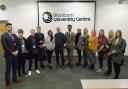 Amrita (fifth from left) with students at the Blackburn University Centre