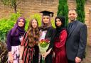 Amani with her family at her graduation