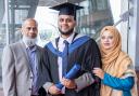 Mohammed with family at his graduation