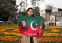 A supporter of former prime minister Imran Khan during a rally in Lahore on Sunday (AP Photo/K.M. Chaudary)