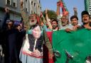 Supporters of Pakistan’s former prime minister Imran Khan’s Pakistan Tehreek-e-Insaf party chant slogans during a protest against alleged vote-rigging (AP Photo/Fareed Khan)