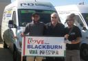 Members of the Blackburn team with George Galloway