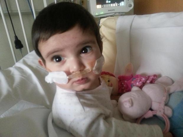 Asian Image: At just 11 days old, Sawda was forced to have open heart surgery.
