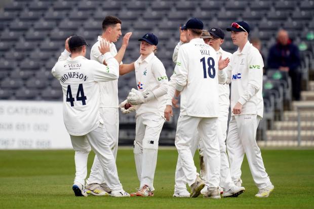 Yorkshire’s Matthew Fisher celebrates taking the wicket of Gloucestershire’s Ben Charlesworth at the County Ground. Picture: David Davies/PA Wire