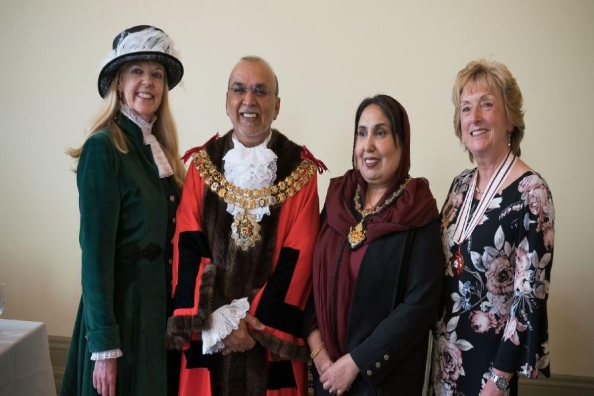 High Sheriff of Greater Manchester Lorraine Worsley-Carter DL and Deputy Lieutenant of Greater Manchester Judith Bromley stood with new Bolton Mayor and Mayoress Cllr Akhtar Zaman and Nargis Zaman