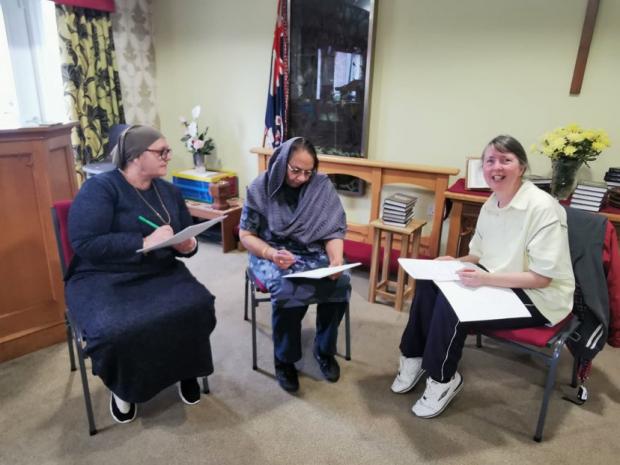 Asian Image: Aish and two of the other carers who completed the six week course
