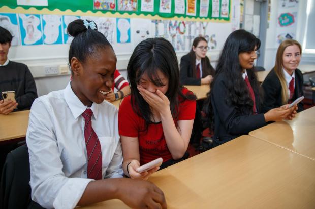 St Roch's pupils view their results by text message Picture: Colin Mearns