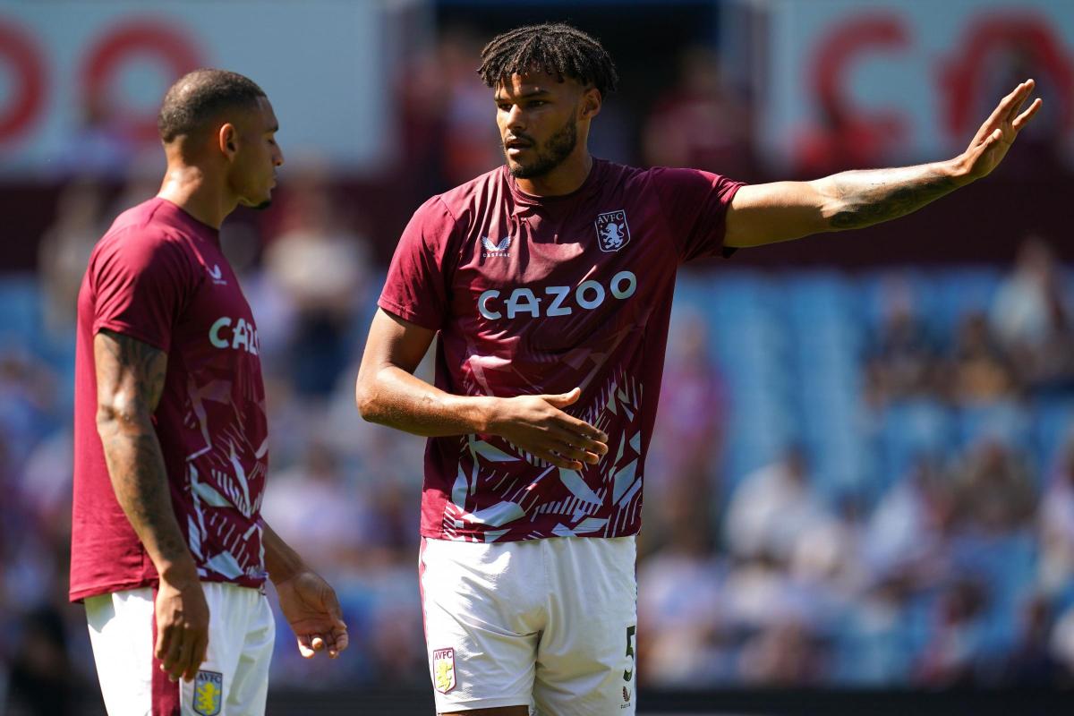 Tyrone Mings (right) was back in the Aston Villa side against Everton