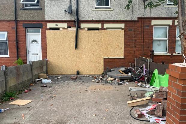 Car crashes into house in 'suspected burglary'