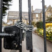 Chained gates at Batley Grammar School in Batley, West Yorkshire, where a teacher has been suspended for reportedly showing a caricature of the Prophet Mohammed to pupils during a religious studies lesson.  (Friday March 26, 2021.)