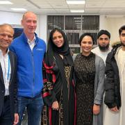 Professor Munavvar (eft) with Dan Hill, chief officer of Rosemere Cancer Foundation and volunteers who helped to organise the Iftari