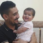 Afraa was born under the rubble of her family home (Ghaith Alsayed/AP)
