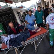 Palestinians wounded in Israeli bombardment of the Gaza Strip are brought to a hospital in Khan Younis, Friday, Dec. 1, 2023. (AP Photo/Fatima Shbair)