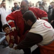 ATTACK: A child is rushed to hospital after another Israeli airstrike
