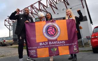 LtR: Humayun Islam, Shazuna Ali, and Lizzie Saunderson outside Valley Parade, the home of Bradford City